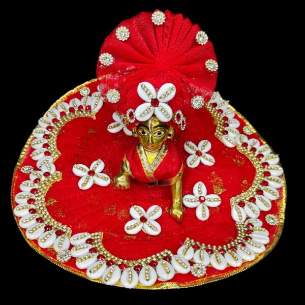 Laddu Gopal Designer Red Cowri Dress with Pagadi. Color- Red , Material- Cotton and Soft Net . PUJABAG makes Premium Quality Dress/Vastra/Poshak for Deities. Size-16 cm or 6 inch approx (small) Dress for Laddu Gopal idol size 2. Size-21 cm or 8 inch approx (Medium) Dress for Laddu Gopal idol size 3 & 4. Size-26 cm or 10 inch approx (Large) Dress for Laddu Gopal idol size 5. Kindly Check Size Chart Before Purchasing Dresses. The Colour might be slightly different due to photographic lighting.